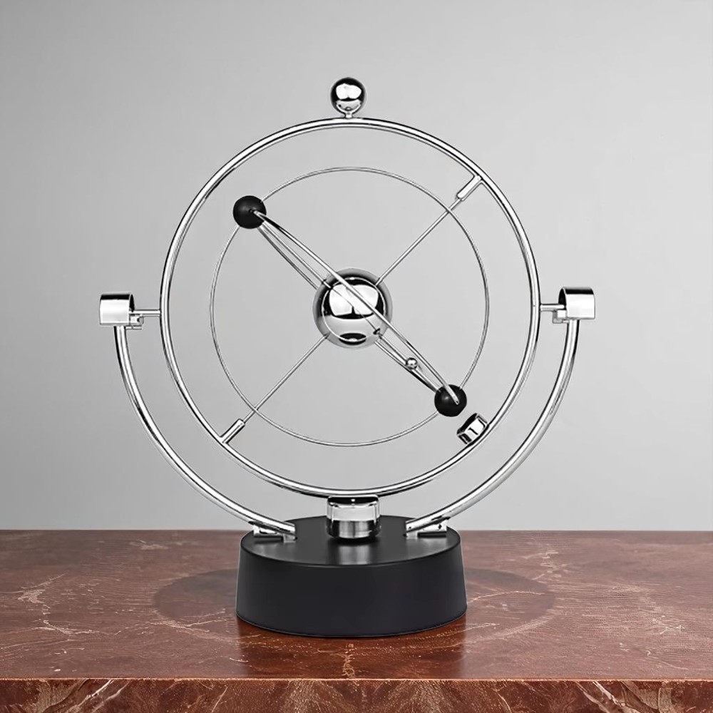 Pendule de Newton sphère en action